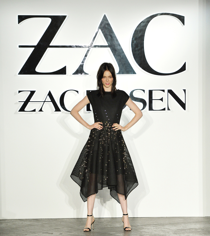 Coco Rocha wearing the animated black dress on the 2015 New York Fashion Week runway. 